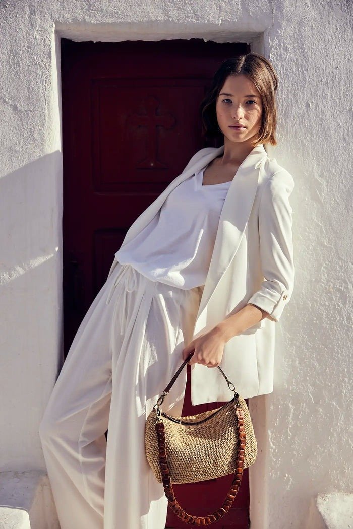 Rafia: il filo d'oro dell'artigianato moderno 4 Sacs chapeaux et pochettes en raphia les accessoires phares de la saison 1 Raphia le fil dor de lartisanat moderne Modalova